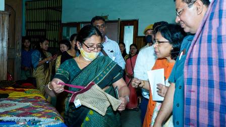 Smt. R. Vimala, IAS, District Magistrate, Kalimpong, examining Jute Diversified Products displayed at the Awareness Workshop. Smt. R. Vimala, IAS, District Magistrate, Kalimpong, examining Jute Diversified Products displayed at the Awareness Workshop.